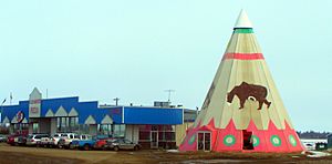 Strip mall and tipi in Rycroft