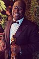 Steve McQueen holding Best Picture Oscar (cropped)