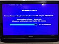 Set-top box firmware being updated