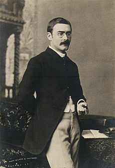 Rudyard Kipling three quarter length portrait (cropped)