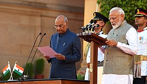 The President, Shri Ram Nath Kovind administering the oath of office of the Prime Minister to Shri Narendra Modi, at a Swearing-in Ceremony, at Rashtrapati Bhavan, in New Delhi on May 30, 2019 (3)