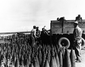 80-G-247135 US Navy Seabees loading ammunition at Roscoff