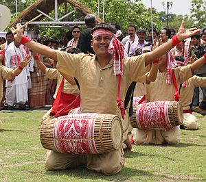 Dhuliya performing in an open stage bihu