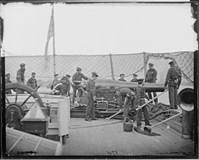 On deck of Gunboat. Bringing Parrott gun into position on board the "Mendota". - NARA - 524794