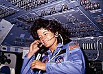 Sally Ride, America's first woman astronaut communitcates with ground controllers from the flight deck - NARA - 541940.jpg
