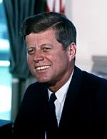 Black-and-white photographic portrait of John F. Kennedy