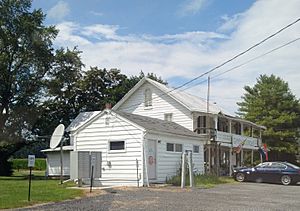 Hydes Post Office (foreground) and the former Ma & Pa RR station and store