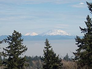 Mt. St. Helens, Mt Rainier, Seen from Mount Calvary Cemetery (Portland, Oregon)
