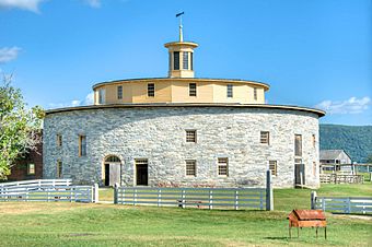 Round Stone Barn with "House form" in the foreground.jpg
