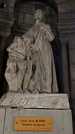 Basilique du Sacré-Cœur de Montmartre- Crypte - Saint Jean de Dieu soignant un malade par Léon Fagel (1851-1913)