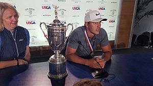 Brooks Koepka with the U.S. Open Trophy