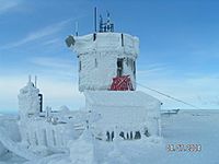 Observatory tower in rime with blue sky