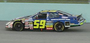 Marcos Ambrose at Homestead-Miami (cropped)