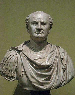 Front view of a bust. He is balding and wears a Roman tunic.