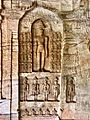 7th - 12th century Mahavira flanked by 24 Tirthankaras in Cave 4, Badami Jain cave temple Karnataka