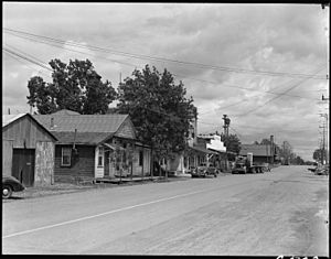Florin, California. Main Street of this small town in the center of the strawberry and grape- produ . . . - NARA - 537883