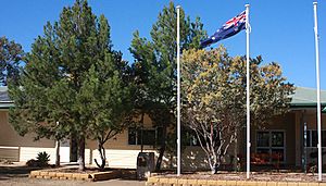 Bunker's Hill State School with flags, circa 2022
