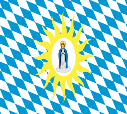 Virgin Mary, praying on a cloud, crowned with a glory; on a white oval; surrounded by a glory of yellow rays; on a field of white and blue lozenges, Bavarian style