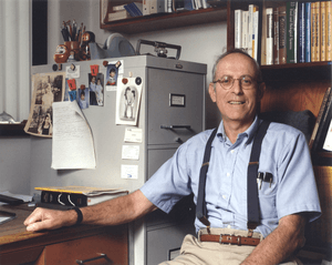Irwin Fridovich in his office.png