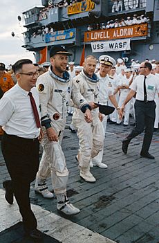 Gemini 12 crew arrives aboard the aircraft carrier USS Wasp