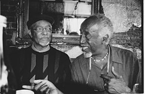 Cleven "Goodie" Goudeau & Eddie Locke in a Harlem cafe by T.J. Walkup