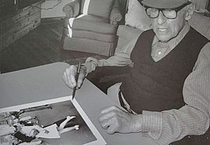 Eisenstaedt signing "VJ day" print on August 23, 1995 at his Menemsha cabin on Martha's Vineyard (cropped)