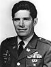 A black and white image showing the head and shoulders of Rocco in his military dress uniform with ribbons.