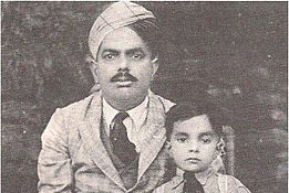 Muhammad Zia-ul-Haq with his father (1929)