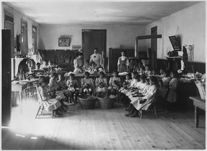 Young school grirls attending sewing class at Albuquerque Indian School. - NARA - 292877