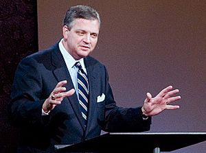 Mohler standing at a lectern, speaking