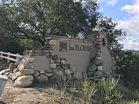 Entrance sign for Las Flores along Oso Parkway