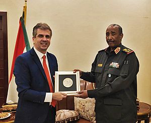Minishter of Intelligence of Israel Eli Cohen and President of Sudan Abdel Fattah al-Burhan