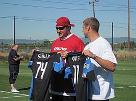 Joe Staley Alex Smith pose with San Jose Earthquakes jerseys