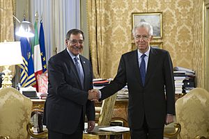 Leon Panetta shakes hands with Italian Prime Minister Mario Monti