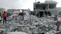 Months after an airstrike on a neighborhood populated by black Yemenis or "Muhamasheen" more than a hundred buildings still remain in rubble and survivors continue to search for any valuables - Sanaa - Yemen - Oct-9-2015