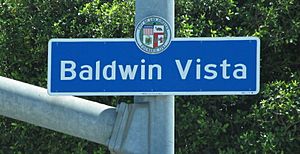 Baldwin Vista neighborhood sign located at the southwest corner of La Brea Avenue and Coliseum Street
