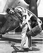 Deanie Parish in front of a P-47.jpg