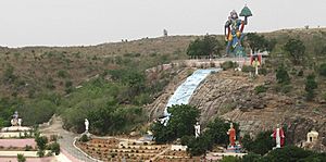 Hill in Prashanthi Nilayam with statues of Hanuman, Krishna, Shirdi Sai Baba, Shiva, Buddha, Christ, Zarathustra