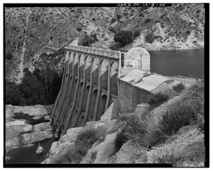 WEST END OF DAM, LOOKING SOUTHEAST, SHOWING DOWNSTREAM FACE OF SPILLWAY. - Little Rock Creek Dam, Little Rock Creek, Littlerock, Los Angeles County, CA HAER CAL,19-LITRO.V,1-29.tif
