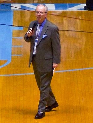Woody Durham walking to center court in Dean Smith Center color corrected closeup.jpg