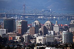 Oakland skyline, with the eastern span of the San Francisco–Oakland Bay Bridge in background