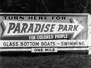 Billboard and direction for Paradise Park, Florida