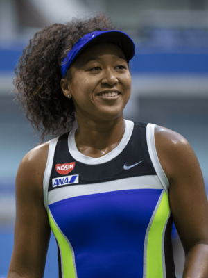 Naomi Osaka smiling during her match against Azarenka in the 2020 US Open.
