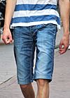 Young man wearing jorts (denim shorts) (cropped).jpg
