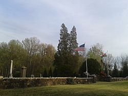 Arvonia's cemetery flies the American and Welsh flags