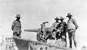 AIF troops with QF 4 inch Mk I-III gun 1914 AWM P00326.017.jpeg