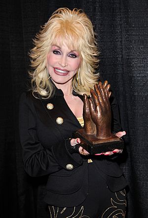 Dolly Parton accepting Liseberg Applause Award 2010 portrait.jpg