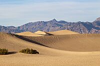 Sand dunes and rocky peaks