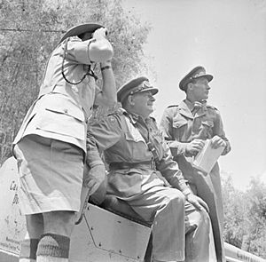 Lieutenant General Sir George Erskine, Commander-in-Chief, East Africa (centre), observing operations against the Mau Mau