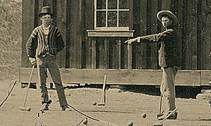 Photo of Billy the Kid (left)